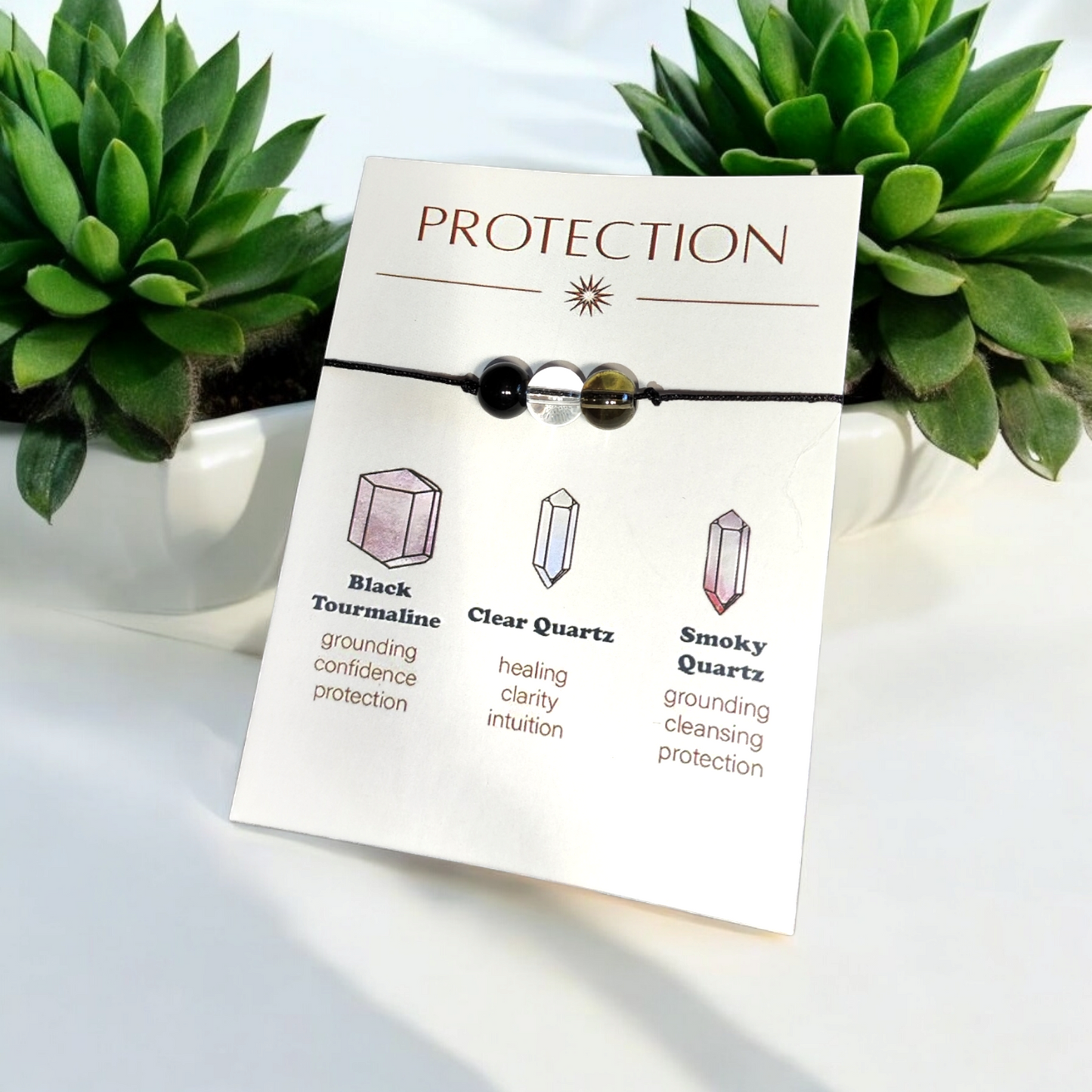 pulsera de protección energética con piedras de turmalina negra, cuarzo cristal y cuarzo ahumado