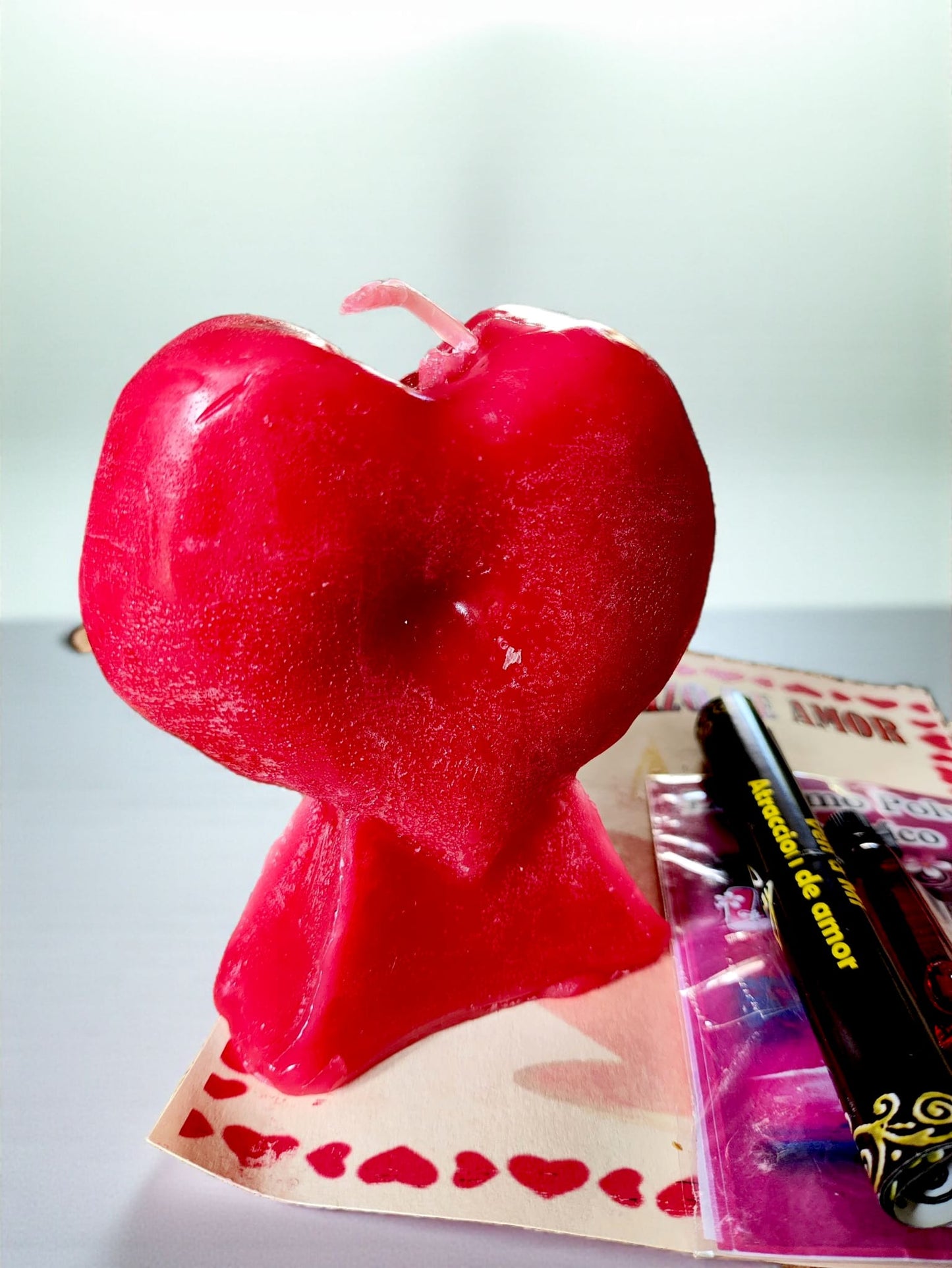 Vela de Ritual Ven a Mí con vela corazón roja para amor y atracción