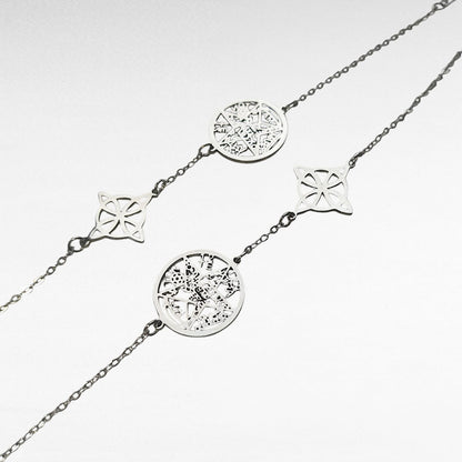 Pulsera Doble Protección en acero inoxidable con Tetragrámaton y Nudo de Bruja en fondo blanco